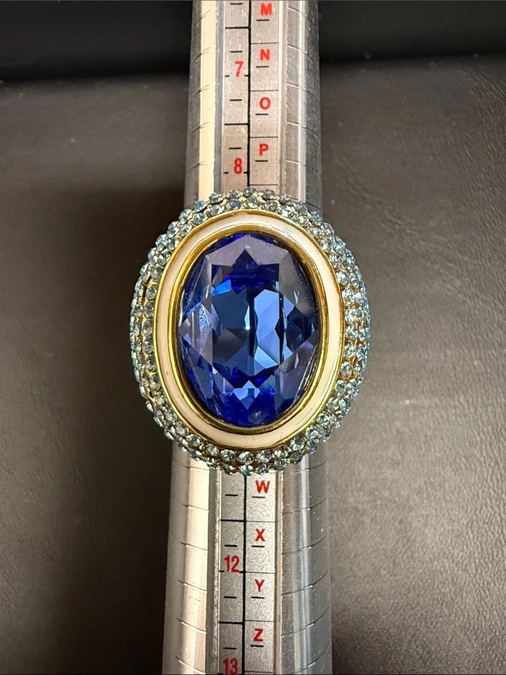 Elegant Women’s Cocktail Ring with Deep Blue Center Stone